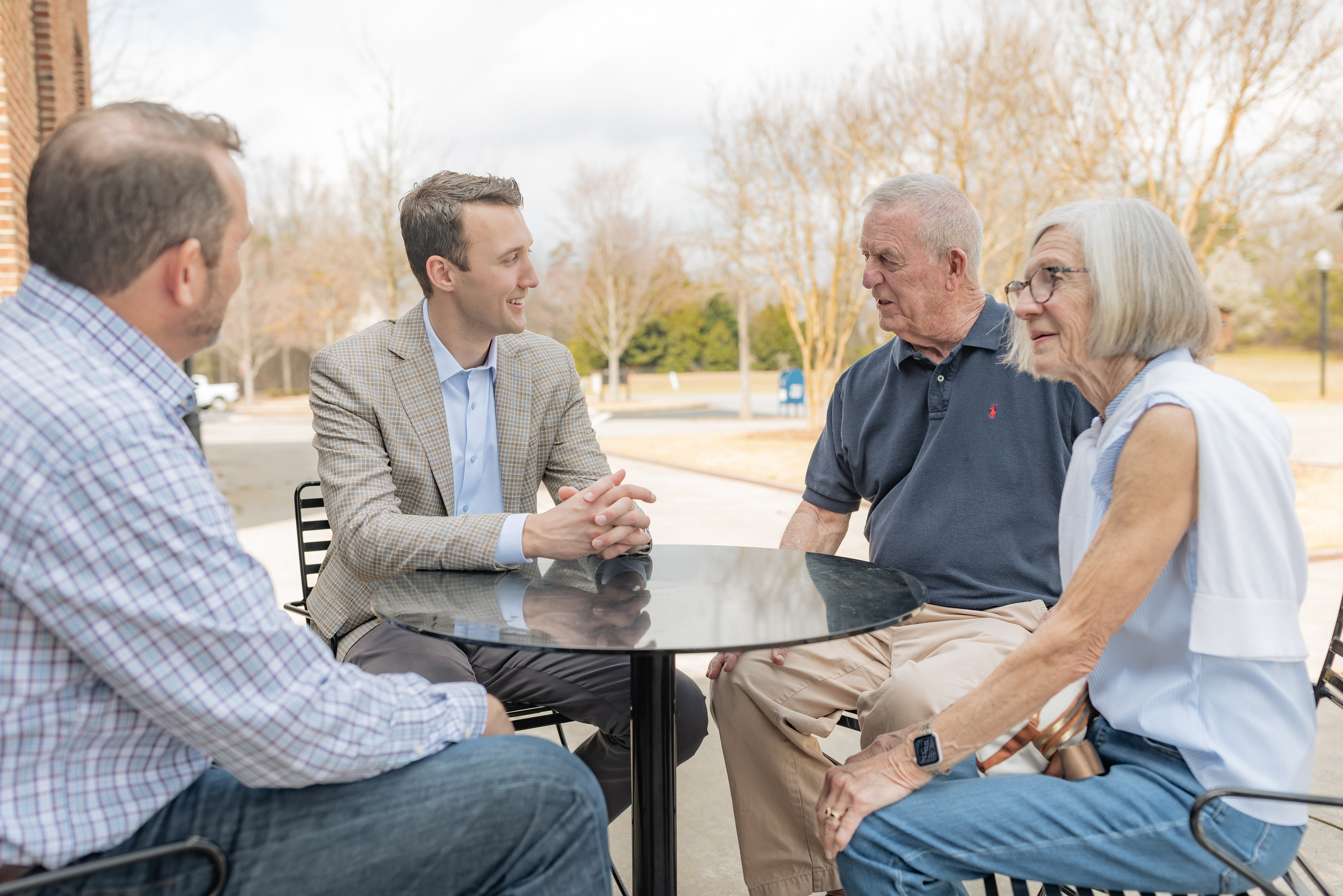 Jack Miller speaking with community members